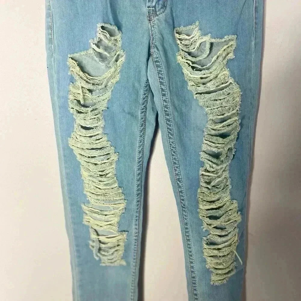 Ripped light blue skinny jeans - Picture 2 of 5